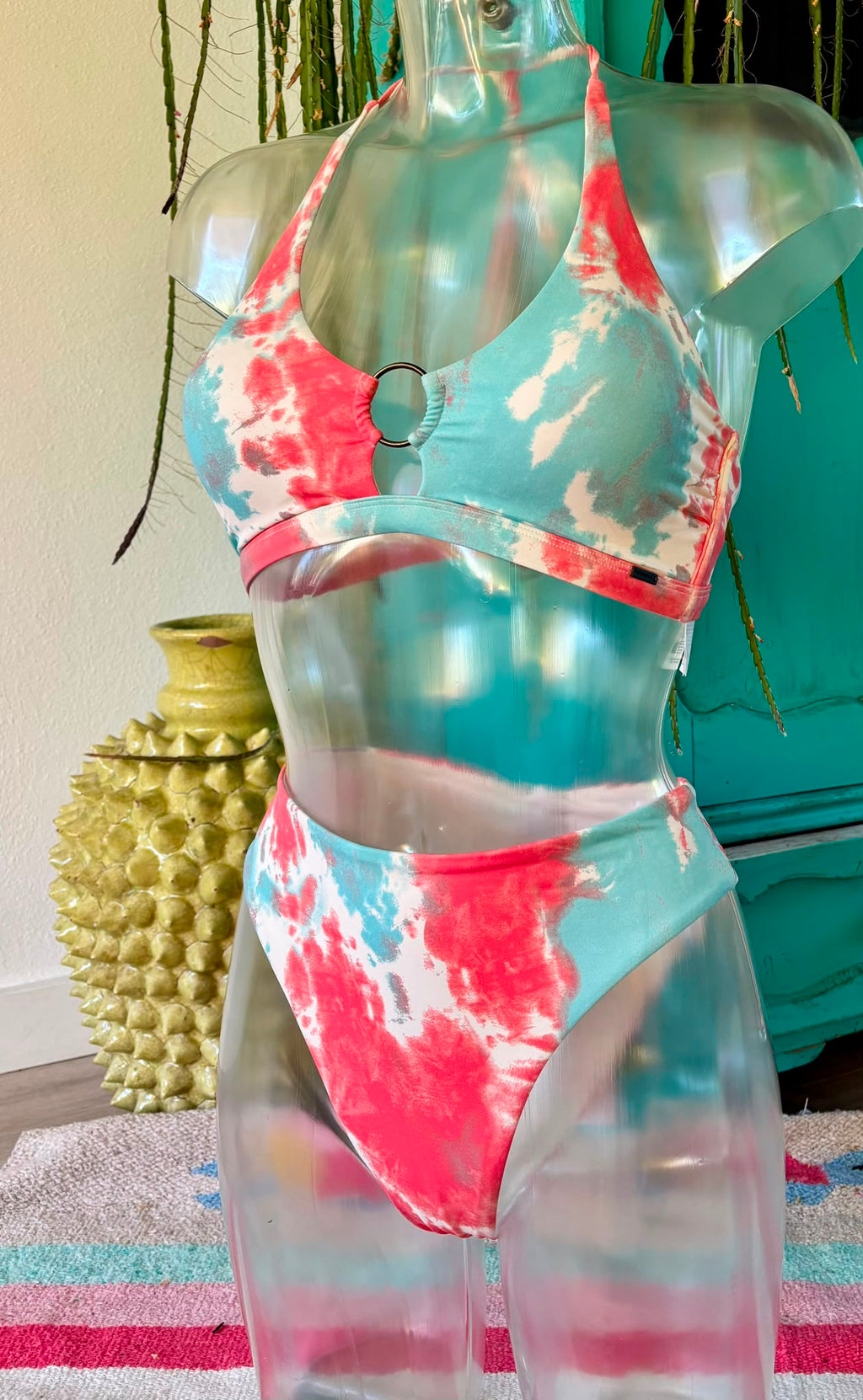 Coral and aqua tie-dye halter bikini with double-ring top and high-rise bottoms, front view
