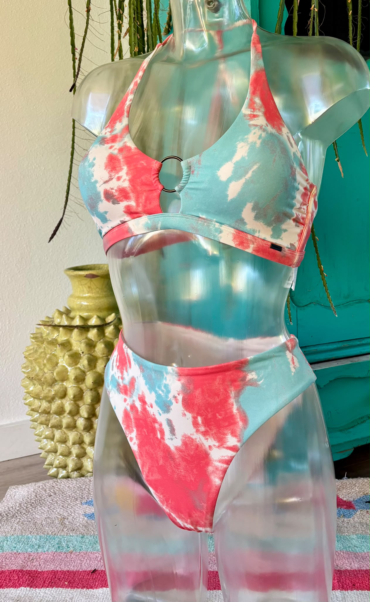 Coral and aqua tie-dye halter bikini with double-ring top and high-rise bottoms, front view