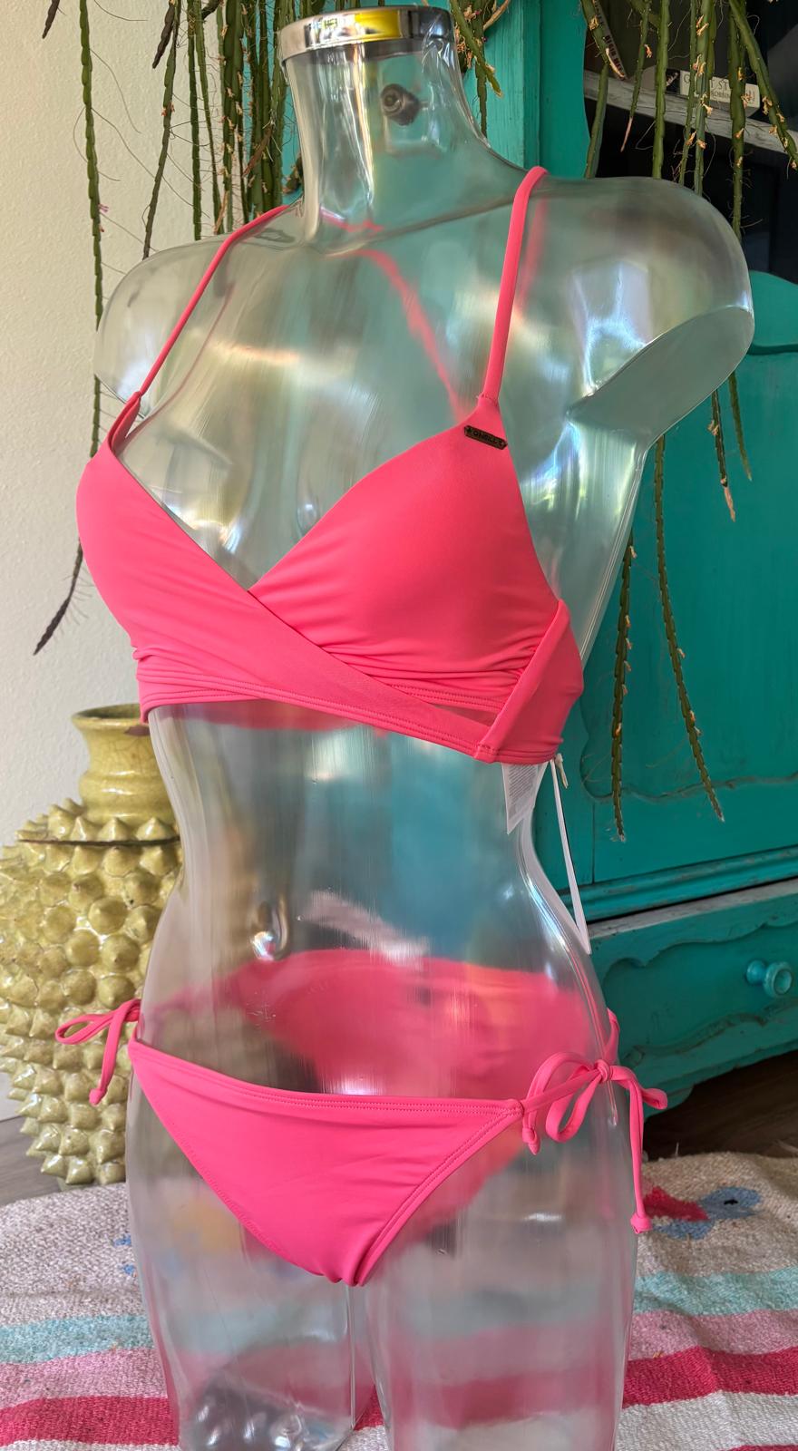 O’Neill bright pink wrap bikini with adjustable straps and tie-side bottoms, front view